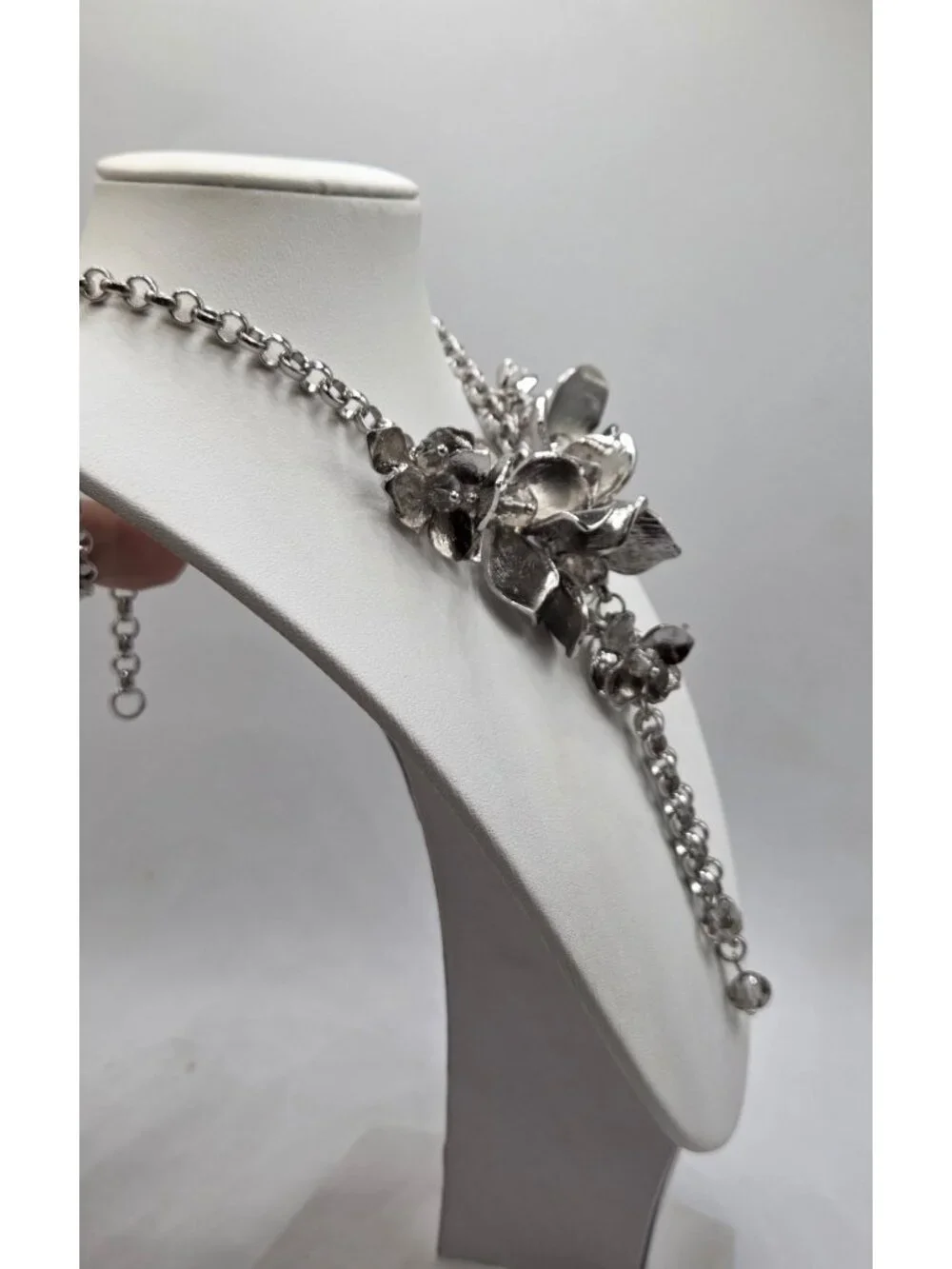 Silver Tone Floral Statement Necklace With Chain Tassels & Crystal Accents